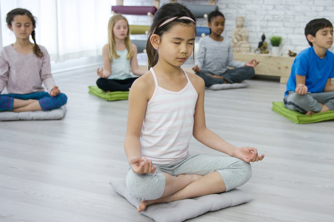 Meditating in Kids Yoga Class